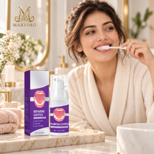 marvino-teeth-woman A woman using Marvino oral care foam with the original bottle and gold Marvino logo